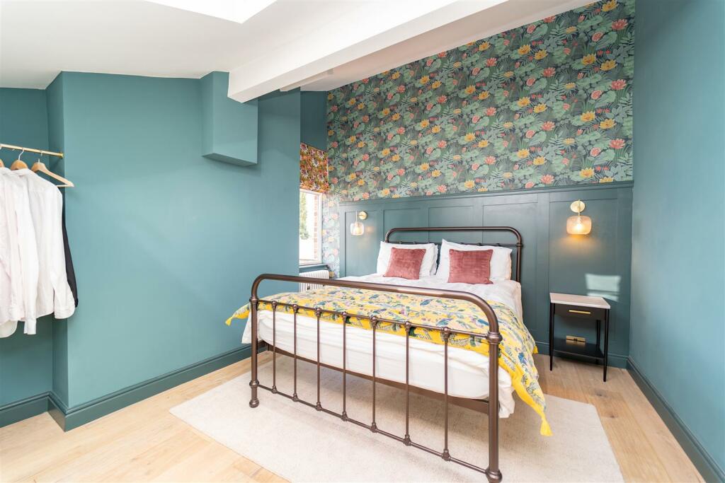 A bedroom at a homestay accommodation