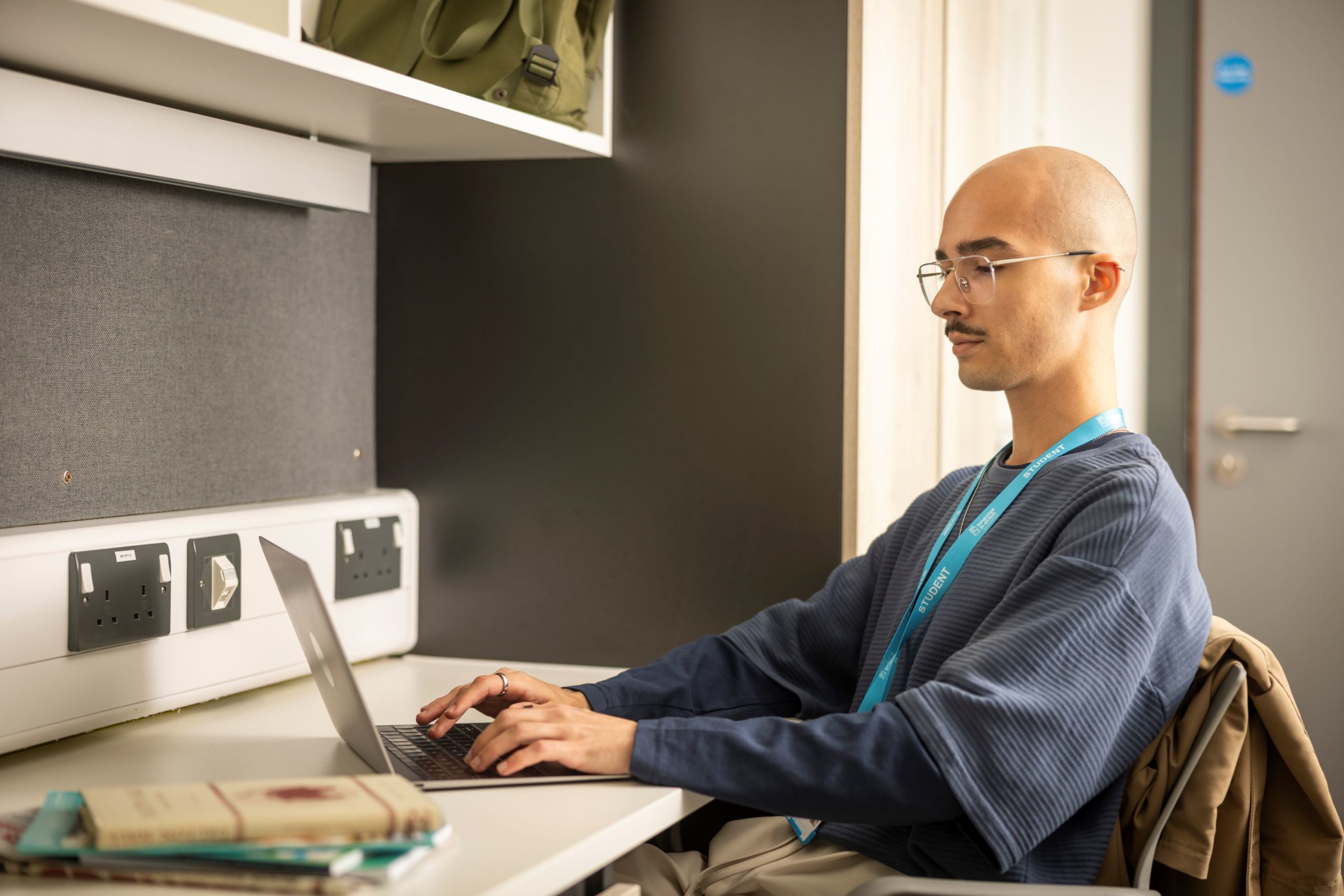 Teacher using laptop